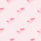 Minimalistic baby seamless pattern with simple unicorn silhouetes. Light pink background