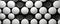 Minimalistic business backdrop with a grid of monochrome circles, symbolizing simplicity, harmony panorama
