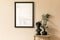 Minimalistic composition of living room interior with black mock up poster frame.