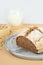 Minimalistic creative beige background with green buckwheat bread nd organic buckwheat milk. Harmless, wellness, gluten free