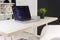 Minimalistic digital nomad home office workspace