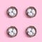 minimalistic Easter composition. pattern of four decorative nests on a pink background.