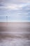 Minimalistic long exposure looking out to sea at Bawdsey, Suffolk, UK. Frame contains a lot of empty space