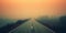 Minimalistic misty empty road. Foggy highway. Mystery travel concept. Generative AI