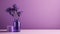 Minimalistic Purple Vase In A Lilial Flower-filled Room