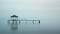 Minimalistic Seascape Photography: Serene Pier On A Foggy Day