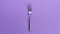 Minimalistic Silver Fork On Purple Background For Design Concept