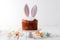 Minimalistic style Easter cake decor, white background