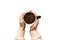 Minimalistic style woman hand holding a cup of coffee on Colored background. Flat lay, top view cappuccino cup. Empty