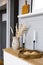 Minimalistic stylish modern Scandinavian decor in the kitchen. Dried flowers in a vase, white candles on black candlesticks and