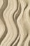 Minimalistic vertical textured sand art background with waves