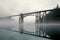 minimalistic view of a cantilever bridge on a cloudy day