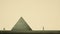 Minimalistic Woman Beside Pyramid: Conceptual Art By Alessandro Gottardo