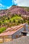 Mining building in the mountains near fall