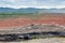 Mining dump trucks working in Lignite coalmine