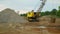 Mining gravel sand pit excavator digger dredger extraction machine colliery output quarry building gray pile mine surface grit