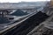 mining site, with conveyor belts transporting coal from the mine to nearby processing facility