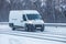 Minivan moves on winter road