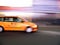 Minivan taxi speeds through Times Square, New York City