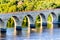 Minneapolis, MN, river and bridge with runner near downtown