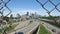 The Minneapolis Skyline through a Chain link Fence