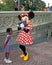 Minnie Mouse signs autograph