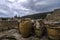 Minoan Pithoi Pithoi is the Greek name of the large storage containers at the archaeological site of Knossos in Heraklion city