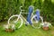 Minsk, Belarus, 23-May-2015: Garden composition - bike and cyclist figures from jeans on holiday in nursery \