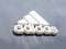 MINSK, BELARUS 4.11.2019: Trade sign Adidas with a logo for the sale of stylish and fashionable clothes, brand