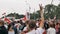 Minsk, Belarus - August 23, 2020: Activists protesting in the city. Crowd of activists raise hands, peaceful people in a