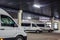 MINSK, BELARUS - JANUARY 2020:  rows of new white minibuses and vans on parking