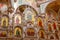 Minsk, Belarus - June, 2019. Altar with lots of mural paintings of images of saints in All Hallows Church