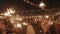 Minsk, Belarus - June 29, 2021: Happy newlyweds dancing in a circle of guests with sparklers in their hands at a wedding