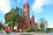 Minsk, Belarus, September, 28, 2015. People walking near the church of St. Simeon and St. Helena on Independence square in Minsk,