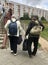 MINSK, MINSK, BELARUS 7 JULY 2019, An elderly couple returns from their summer cottage. Behind them they have heavy backpacks, in