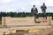 Minsk Region. Belarus. February 24, 2016. Workers drill holes for driving Nagel. construction of bony from natural wood