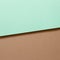 Mint blue and brown layered color paper background