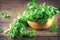 Mint. Bunch of fresh green organic mint leaf on wooden table closeup