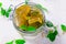 Mint candies in a glass jar.