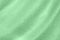 mint colored Background of soft draped fabric