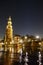 Mint tower seen from the river Amstel at night