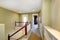 Mint upstairs hallway with white railings