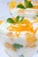 Mint yogurt dessert with oranges