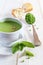 Minty Pea Soup and baguette on light background