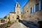 The minuscule old hilltop village of Maubec-Vieux. A magnificent clock tower, topped by a statue of the Virgin, in the small