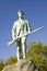 Minuteman soldier from Revolutionary War greets visitors to Historical Lexington, Massachusetts, New England