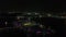 Miraculous night view of Indian resort from drone. Surrounding lake and colorful beautiful lights.