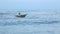 MIRISSA, SRI LANKA - MARCH 2014: Local fisherman in his boat in Mirissa. These traditional fishermen find it harder to make a