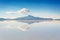 Miror effect and reflection of mountain in Salar de Uyuni Uyuni salt flats, Potosi, Bolivia