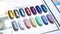 Mirror glitter Nail Polish Color Charts. Nail polish swatches in different fashion color. Colorful nail lacquer in tips. Shiny gel